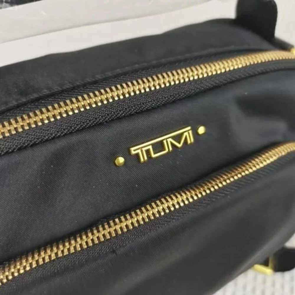 Tumi Voyageur Troy Zip Pocket Crossbody Bag in Black/Gold